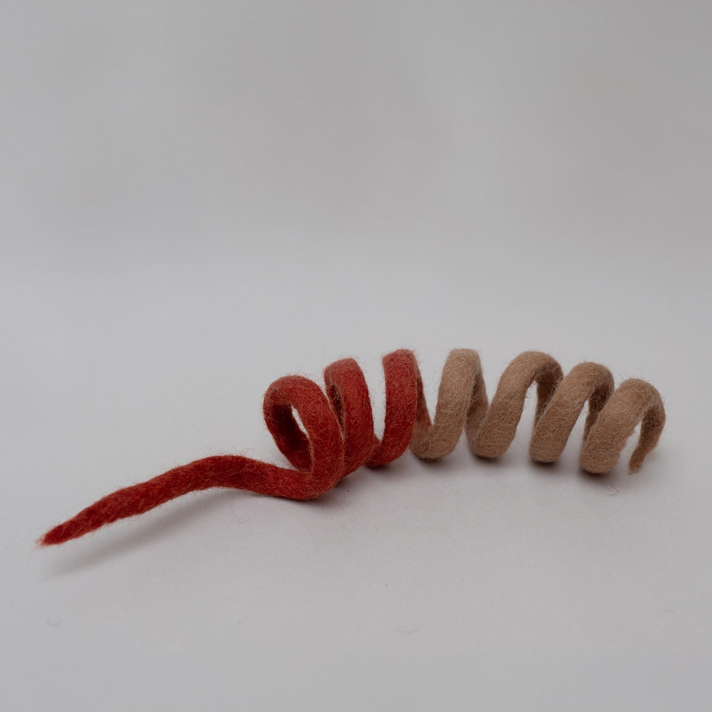 Felt Spiral Cat Toy – Handmade Wool Chaser Toy